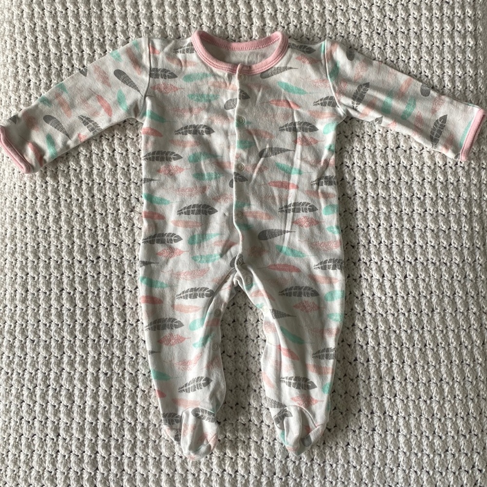 White button down sleeper with pink, gray and teal feathers